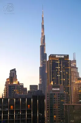 a view of a city skyline with the tallest building at Stylish 2BR Apt in Business Bay Burj & Creek Views in Dubai