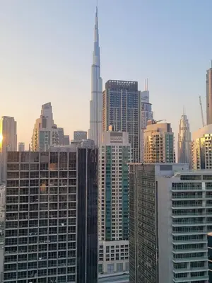 a view of a city with tall buildings at Stylish 2BR Apt in Business Bay Burj & Creek Views in Dubai