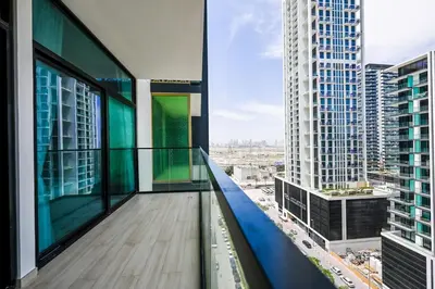 a balcony in a building with a view of a city at Stunning 1 Bdr luxury residence at JVC in Dubai