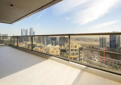 a balcony with a view of a city at Stylish 2BR Downtown Apartment Burj & Mall Nearby in Dubai