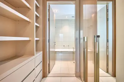 a bathroom with a shower and a sink at Spacious 2 Bedroom Apartment in DAMAC Towers by Paramount Dubai with Pool Gym Free Parking Sleeps 4 by Stayfinity in Dubai