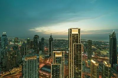 a view of a large city with tall buildings at Great View from 63th Floor! Amazing Pool with Burj View! Grande Signature! in Dubai