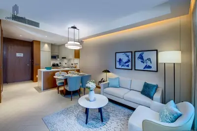a living room with a couch and a table at Luxury 1-BR at Dubai Opera Stay in Dubai
