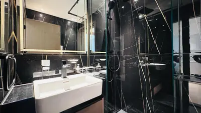 a bathroom with a sink and a mirror at OYO HOME 1457 Premium 1bed Apartment In Jvc Bh in Dubai