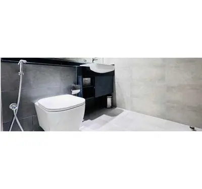 a bathroom with a toilet and a sink at OYO HOME 1458 Premium 1bed Apartment In Jvc Be1005 in Dubai