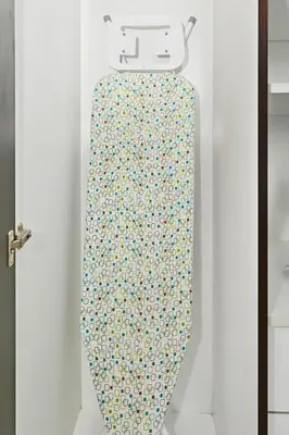 a tie hanging from a door in a room at Serene Escape in Bustling Marina and JBR, Ensuite 2BR, Sky Garden Access in Dubai