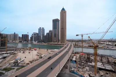 a view of a city with a highway and buildings at KeyRock Living - Zada 1BR with Pool & Gym Access in Dubai
