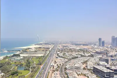 an aerial view of a city with a highway at Frank Porter - Palm View in Dubai