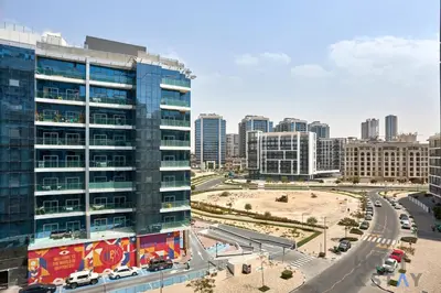 a view of a city with a tall building at Boho-Chic Comfort - 1BR Haven - Marquis 2020 Arjan in Dubai