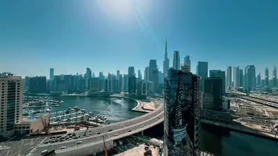 a view of a city with a river and buildings at Urban 1BR City view in The Bay Business Bay in Dubai