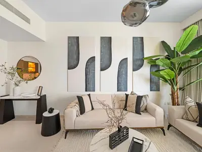 a living room with a couch and a table at Utra Lux Large 1 BR with Sunset Views and Private Beach in Dubai