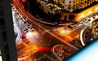 an overhead view of a busy city street at night at Great Flat Near Marina & Beach With Amazing View, Many Activities in Dubai