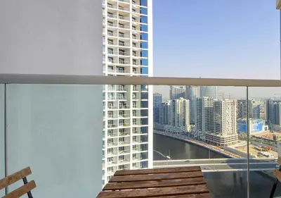 a view of a city skyline from a balcony at Modern Living DAMAC with Balcony & Waterfront Views in Dubai