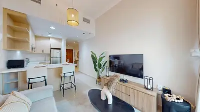 a living room with a couch and a table at Vacationer I Premium 1 Bed I Dubai Marina Living & Metro Nearby I Dream Tower in Dubai