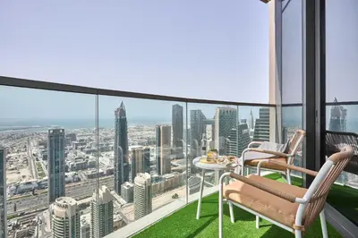 a balcony with a view of a city at Frank Porter - Grande Signature Residence in Dubai