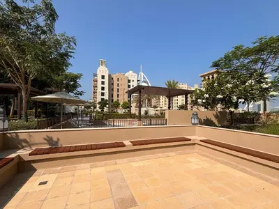 a large patio with a view of a city at Frank Porter - Lamtara 3, MJL in Dubai
