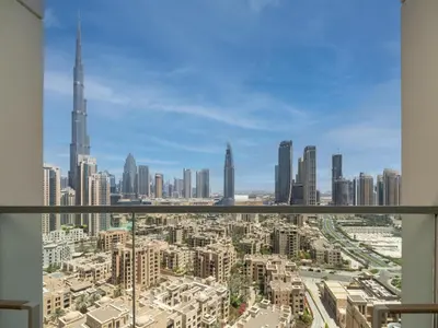 a view of a city skyline with tall buildings at Modern Downtown 2 Bed plus Maids with Full Burj View in Dubai