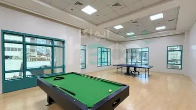 a billiard room with a pool table in it at Luxury 1 Br Marina Near Tram Ain Sea View Balcony in Dubai