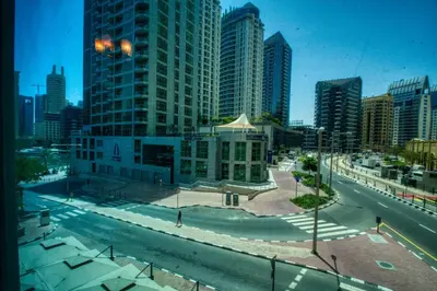 a view of a city with tall buildings and a street at The Smart Concierge - Delphine in Dubai
