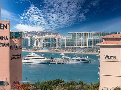 a view of a harbor with boats in the water at DreamShoma-Sea View 2BR Pool Gym in Dubai