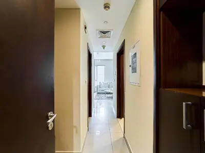 a hallway with a door leading to a room at Golden Homes 29 blvd tower Urban nest 1BR Near Dubai mall & burj khalifa downtown dubai in Dubai