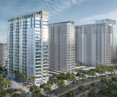 a group of tall buildings in a city with palm trees at Park Heights 2 Dubai Hills 1BR by Happy Season in Dubai