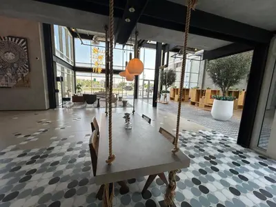 a room with a swing in a building at Fully-equipped 1-br in Dubai Hills great amenities in Dubai