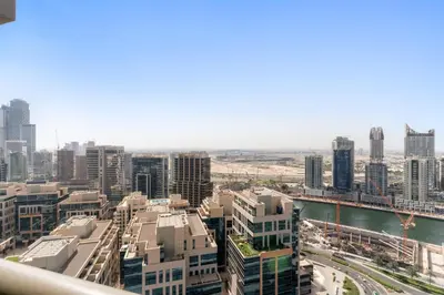 an aerial view of a city with tall buildings at Cozy Studio in Downtown Dubai in Dubai