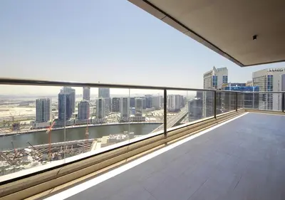 an empty balcony with a view of a city at Downtown Dubai Stay in 2BR Chic Elite Apartment in Dubai