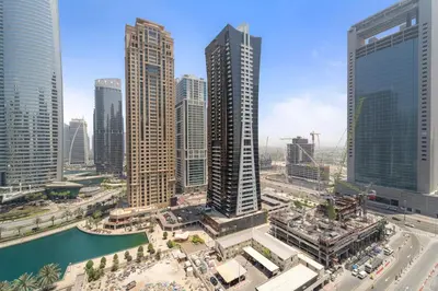 an aerial view of a city with tall buildings at Stylish 2BR in Royal MBL in Dubai