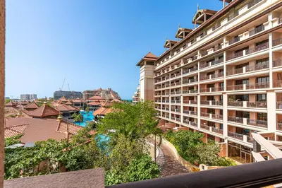 a view of a large apartment building from a balcony at Spacious 2 Bed Unit With Aquaventure Waterpark Views in Dubai