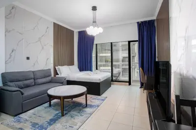 a living room with a couch and a table at super Luxurious Apartment Downtown Dubai Mall burj khalifa DIFC in Dubai