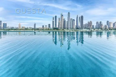 a view of a city from a body of water at Emaar Beachfront - Sunrise Bay Tower 1, Dubai Marina in Dubai