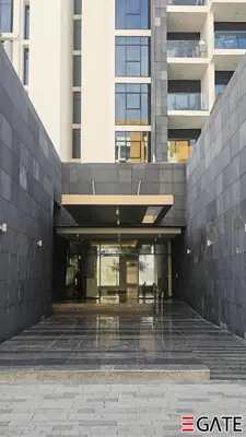 an entrance to a building with a building at EGATE - Studio - 2nd Floor with Balcony - Dubai - 33-212 in Dubai