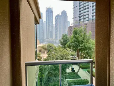 a view of a city skyline from a balcony at Stylish Apartment - Dubai Marina in Dubai