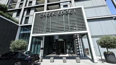 a car parked in front of a building at Luxury 2BHK & Lagoon view in Dubai