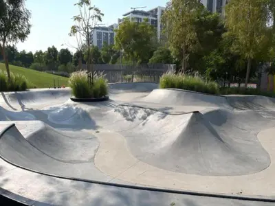 a skate park with a skateboard ramp in a park at Chic 2BR in Mulberry with Dubai Hills Park Views in Dubai