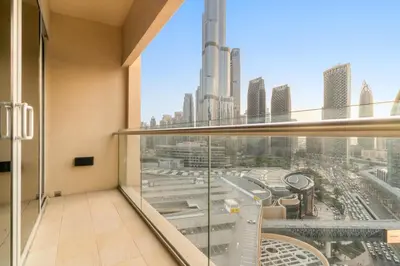 a balcony with a view of a city at FIRST CLASS Studio Stunning Burj Khalifa Views in Dubai