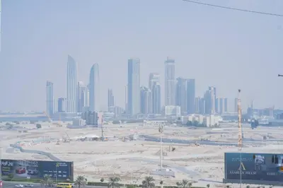 a view of a city with tall buildings at 2BR Spacious Pearl with Stunning City Views - Holiday Boulevard in Dubai