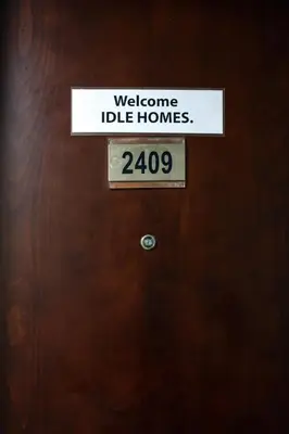 a sign on a door that reads welcome ide homes at IDLE 1Bed Marina POOL &JBR BEACH in Dubai