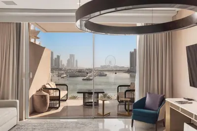 a living room with a view of the water at Sea View 2BDR Apartment, Pool and Beach Access in Dubai