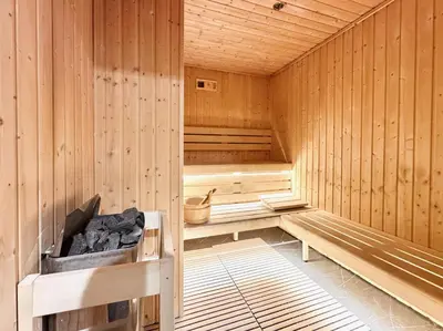 a wooden sauna with a bench and a tub at Exclusive 4 Months Offer Exclusive 3 bedroom with Private Pool with 1 free houskeeping in Dubai