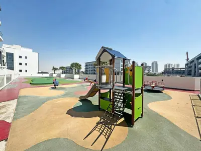 a playground with a slide in a park at Exclusive 4 Months Offer Exclusive 3 bedroom with Private Pool with 1 free houskeeping in Dubai