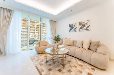 a living room with a couch and a table at Partial Marina and City Views 1BR, Close to JBR Beach, Palace Beach Residence Tower 2,Emaar Beachfront ,Dubai Marina by Deluxe Holiday Homes in Dubai