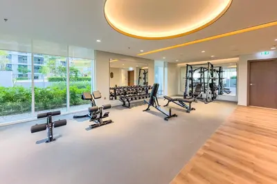 a gym with treadmills and cardio equipment in a building at Partial Marina and City Views 1BR, Close to JBR Beach, Palace Beach Residence Tower 2,Emaar Beachfront ,Dubai Marina by Deluxe Holiday Homes in Dubai