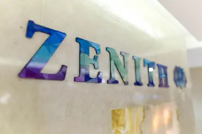a sign that says on a wall at 1Bedroom Apartment with Portable bed in Living Area in Dubai