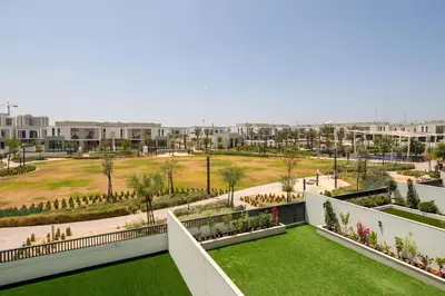 an aerial view of an apartment complex with a lawn at Frank Porter - Murooj Al Furjan West in Dubai