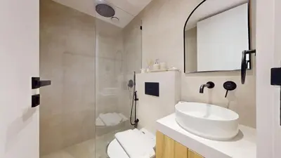 a bathroom with a sink and a shower at Ranches 1 Upgraded Three Bedroom Villa in Dubai