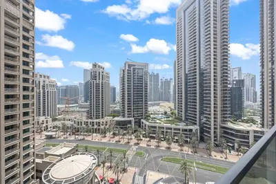 a view of a city skyline with tall buildings at Act tower-1BR near burj khalifa in Dubai