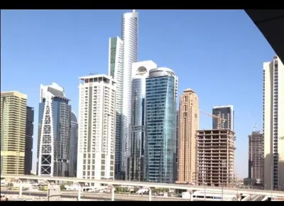 a view of a large city with tall buildings at Upgraded Studio In Dubai Marina in Dubai